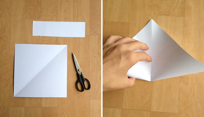 step two of a DIY paper envelope