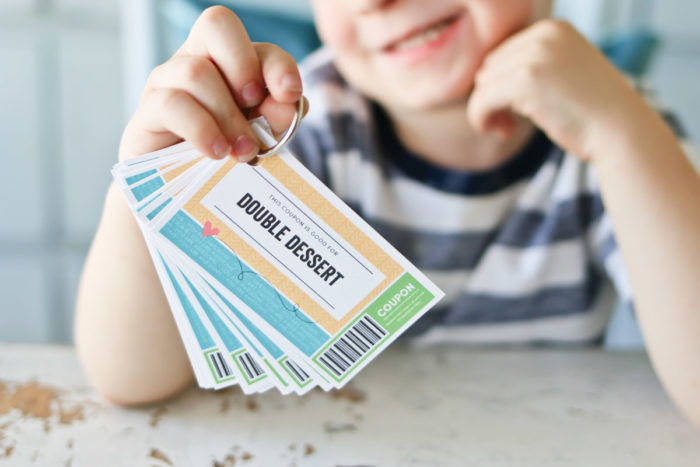 Printed love coupons on a ring to create a coupon book.